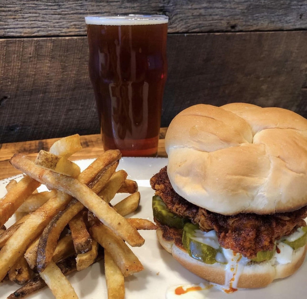 StillWest Brewery and Grill signature dishes Nashville Hot Chicken SandwichBeer Battered Chicken TendersTrout Sandwich